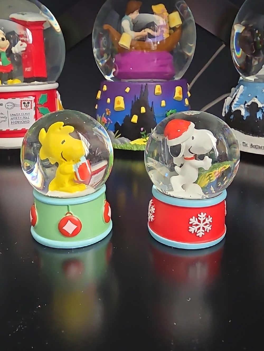 Peanuts Snoopy & Woodstock Holiday Snow Globe Duo - Red, Green, Yellow, Blue